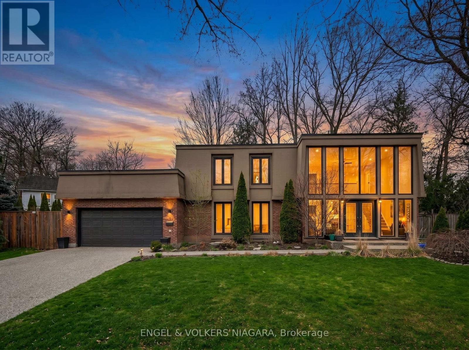 Twilight exterior photo of 2459 Noella Crescent, Niagara Region property listing by Ken Peterkin